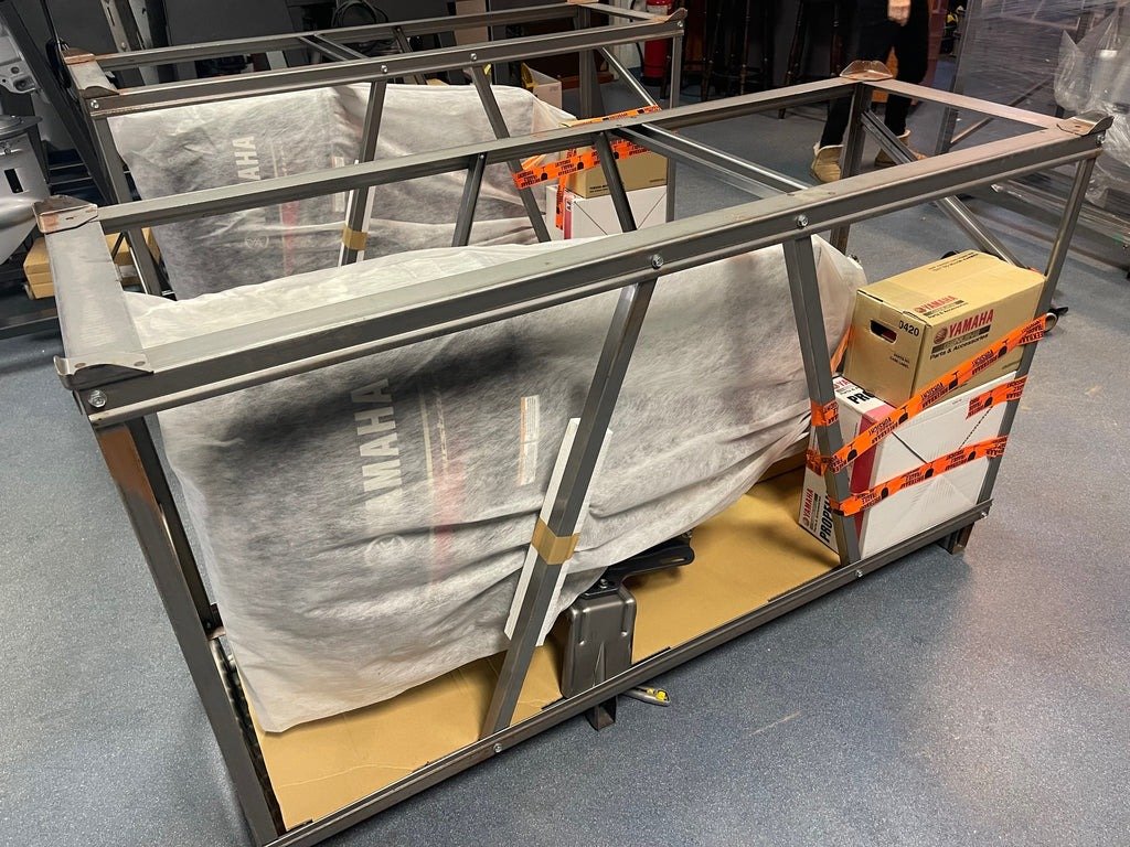 Securely packaged Yamaha outboard motor for return or shipping from Bluey’s Engine Shop Warragul