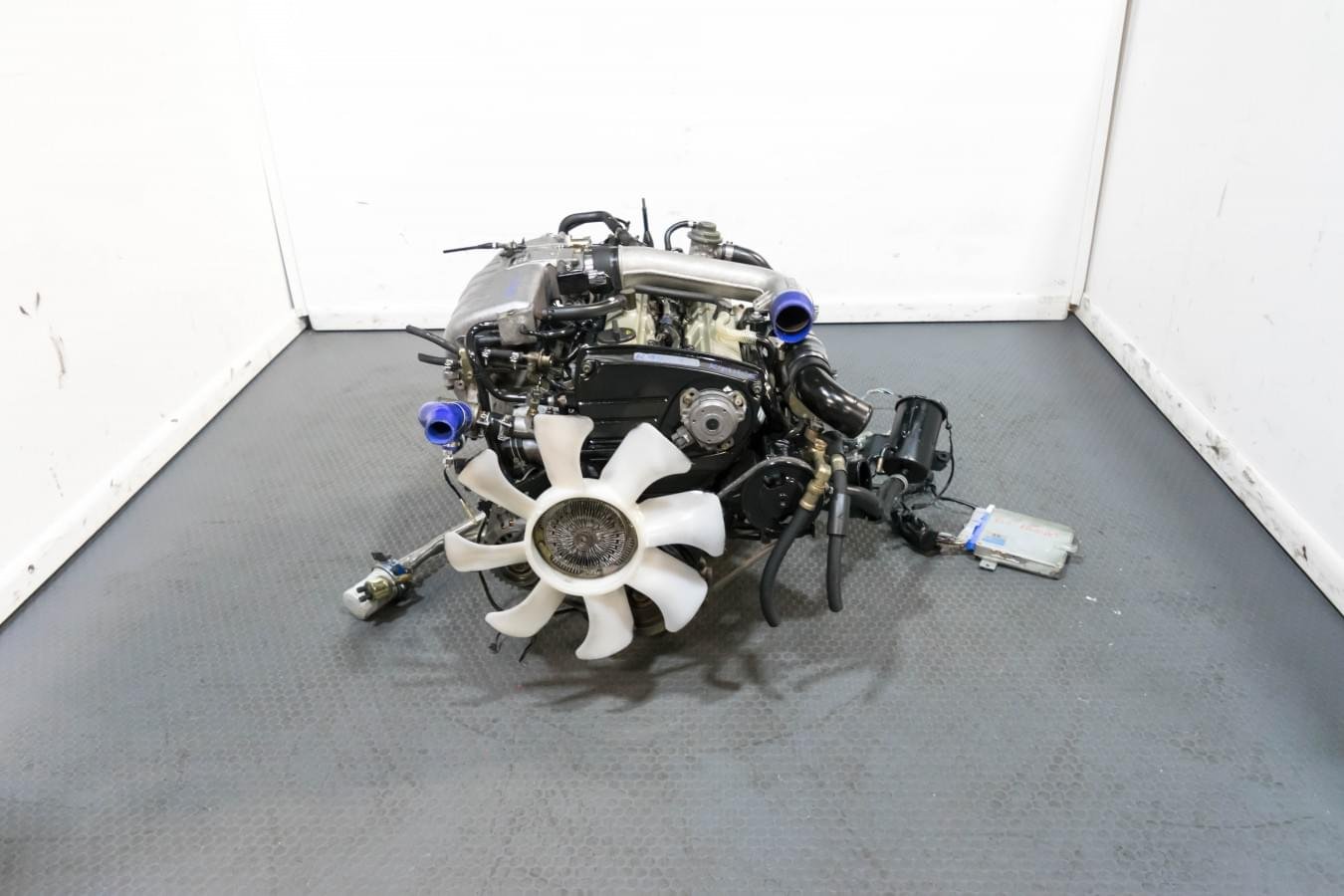 JDM Low Mileage Nissan Skyline GTS-T RB20DET Engine For Sale with 5MT Transmission, ECU, Harness, Oil Filter Relocated, Headers JDM Low Mileage Nissan Skyline GTS-T RB20DET Engine For Sale with 5MT Transmission, ECU, Harness, Oil Filter Relocated, Headers